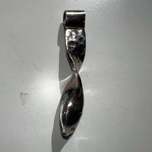 Sterling Silver hammered twisted necklace pendant. About 2 inches long